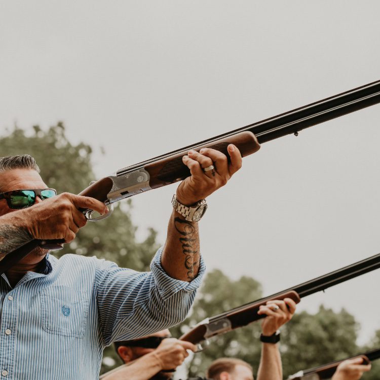 skeet shooting as part of the luxury wedding packages at chateau challain