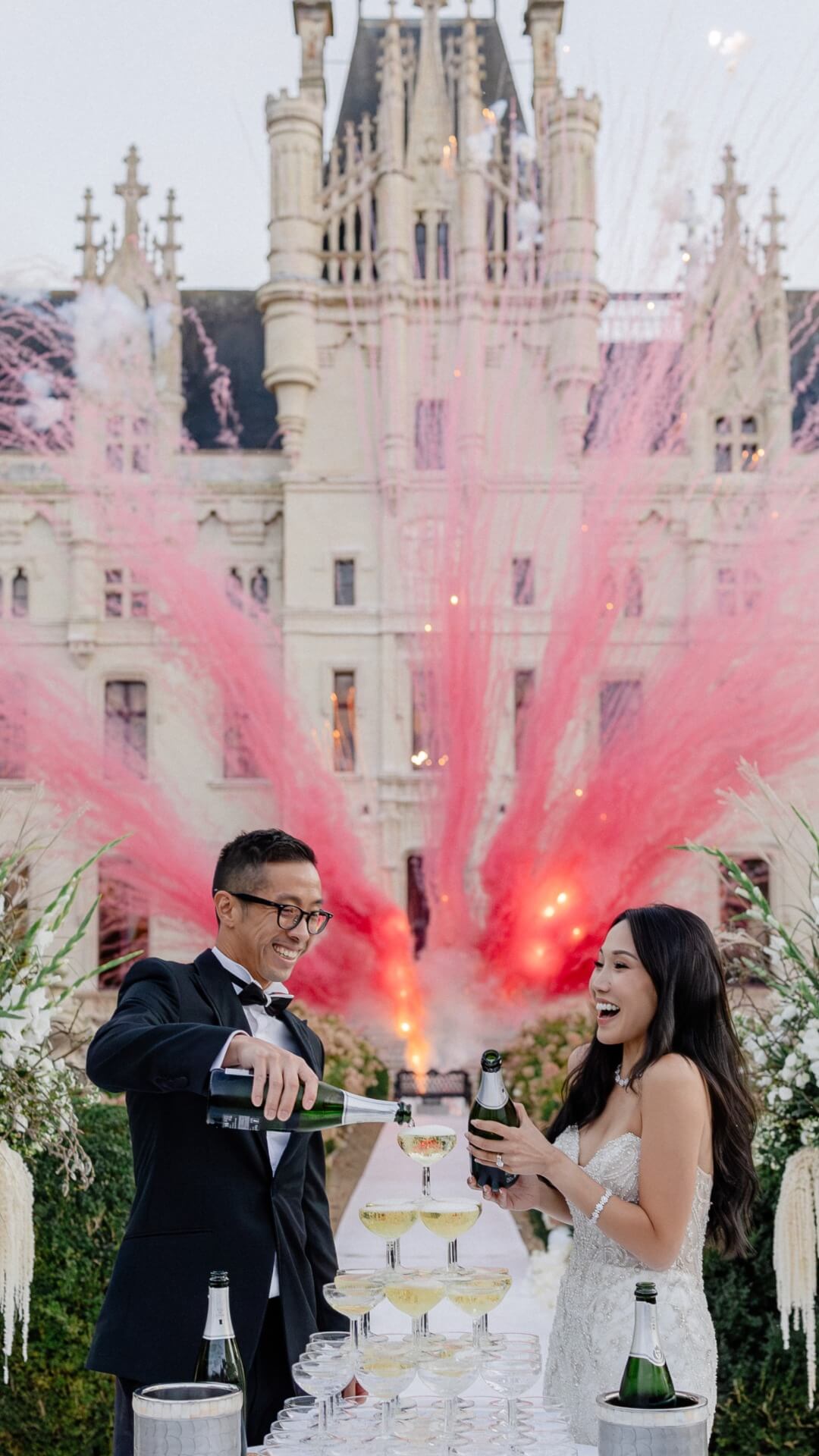 couple celebrating at their luxury castle wedding