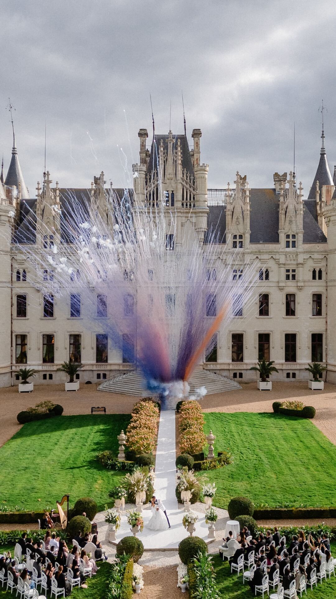 spectacular daytime fireworks at a luxury castle wedding